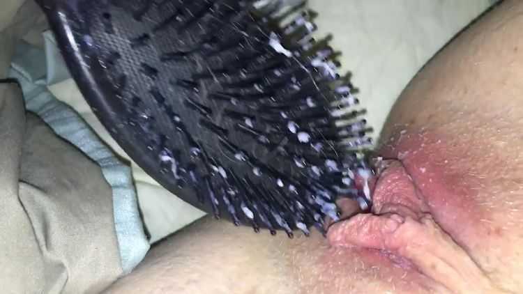 horny amateur girl selfie masturbating with hairbrush