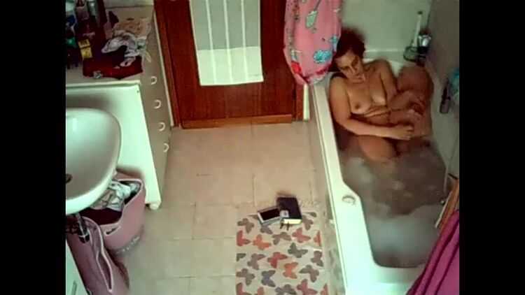 Wife relaxing in the bathtube. hidden cam