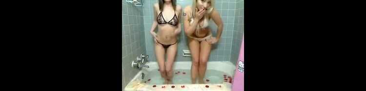 Two hot amateur girls having fun in bath tube