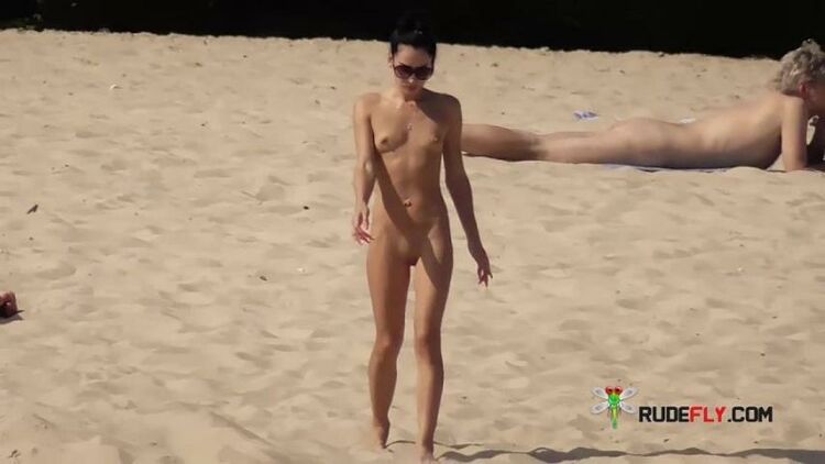 A game of badminton played between teen naturists