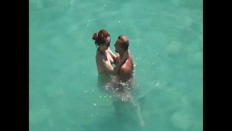 He teaches her how to swim