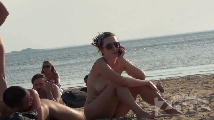 Nude beach, busty young girl, amateur video