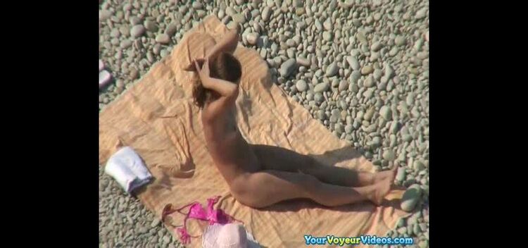 Small boobs nudist sunbathing