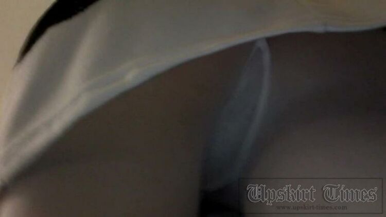 Upskirt-times.com- Ut 2376# Beauty in short white dress and tight white pantyhose. Operator could make...