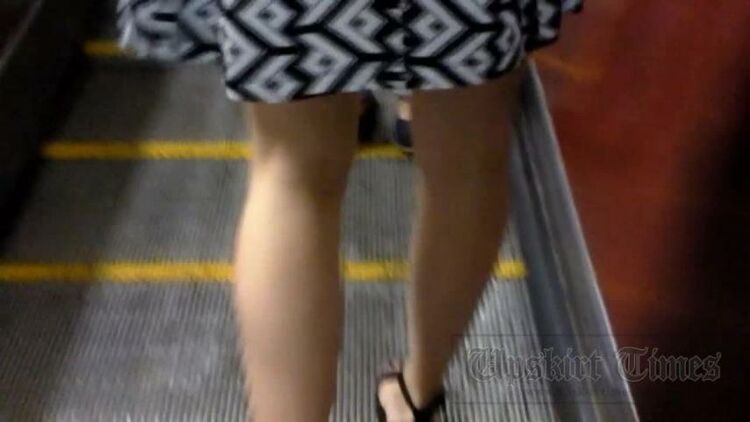 Upskirt-times.com- Ut 2552# Slender brunette cutie in short black-and-white dress. Our upskirt master...