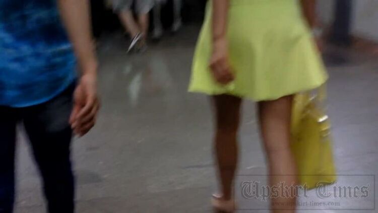 Upskirt-times.com- Ut 2418# Well-tanned brunette babe in short yellow skirt. The draft helped our...