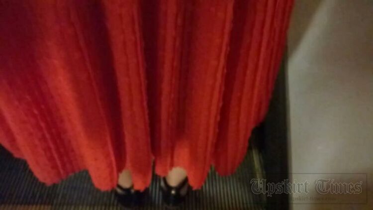 Upskirt-times.com- Ut 3571 Under the skirt of a blonde in a long orange dress. Our operator managed to...