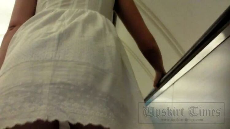 Upskirt-times.com- Ut 2878# Stylish pretty woman in white skirt. Under the skirt were white panties and...