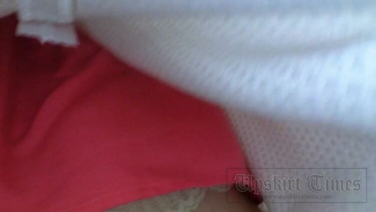 Upskirt-times.com- Ut 3368# A slender girl in a broad white skirt. Our operator several times lifted her...