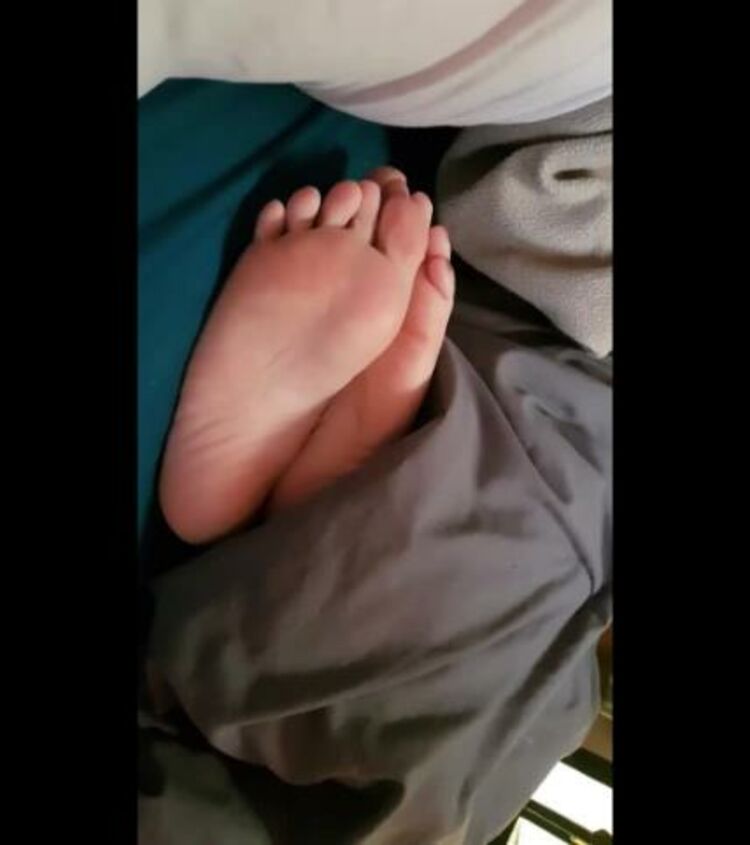 RomanticTingles Feet Sticking Out From Under The Covers-Candid Foot Fetish