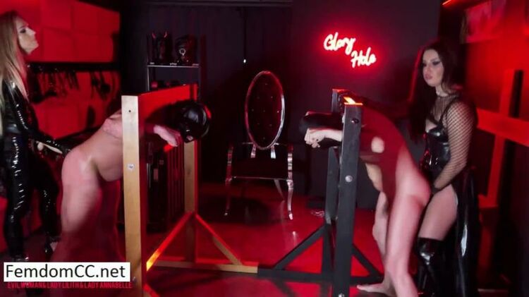 Evil Woman, Lady Lilith, Lady Annabelle – Strap-on party with 3 Dommes and 2 slaves in the stocks – Strap on fucking