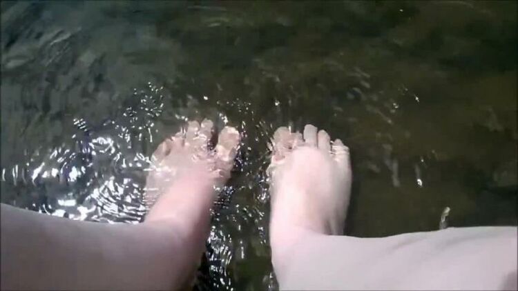 Soaking feet in natural creek