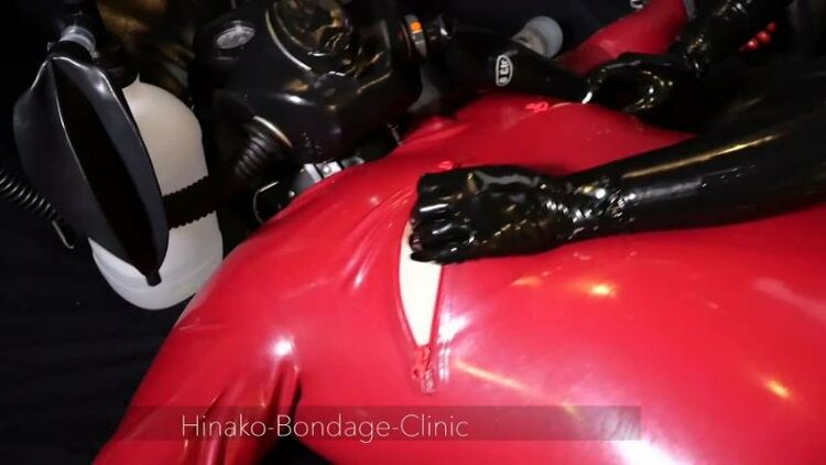 Hinako Bondage Clinic – Large latex Man in Bondage