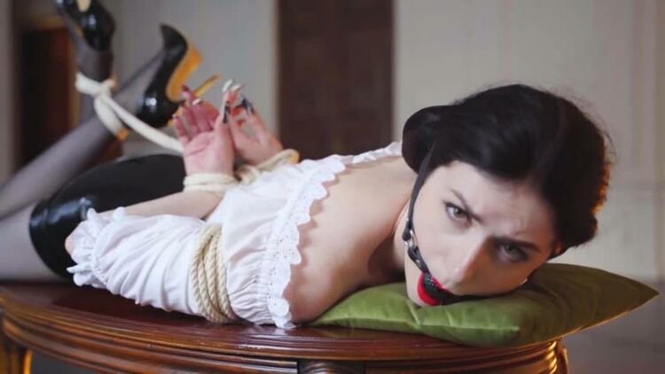 Miss Ellie Mouse – Brunette Tied up With Ropes on a Table Gagged