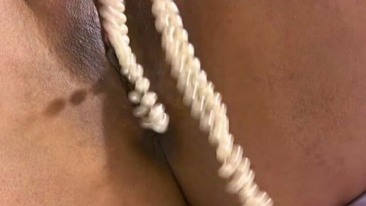 Deena plays with her pearl necklace 1 280 Deena [updated: 2023-11-19]