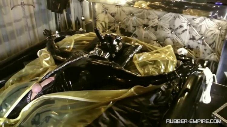 [Femdom 2020] Rubber-Empire – Part 3 “The Rubber Room”. Starring Lady Ashley and Slave [Milking Machine, Handjob, Chastity, Locked Dick] [updated: 2023-12-03]